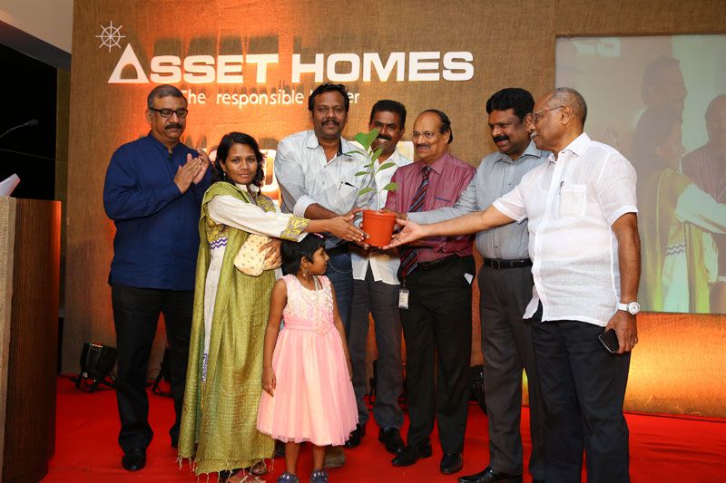 Inauguration of `Treedhan` by Handing over teak sapling by Shri. Reghu Chandran Nair( National Vice President CREDAI) to Baby Shreya Renjith and her mother.